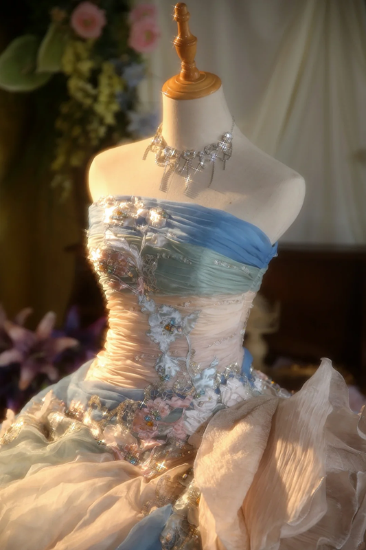 Light blue strapless, waist-cinched ball gown with a puffy skirt; bridal gown R7278