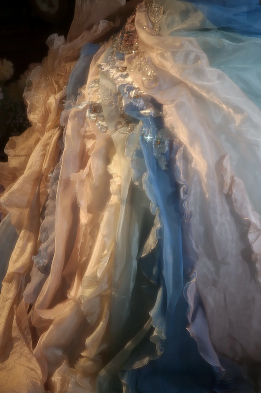 Light blue strapless, waist-cinched ball gown with a puffy skirt; bridal gown R7278