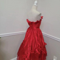 Red strapless ball gown with a cinched waist and an asymmetrical skirt; bridal gown R7297