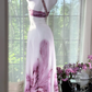 White dress with purple floral print, one-shoulder design, fitted waist, long ball gown R7620
