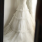 White halter-neck fitted long ball gown with a full skirt R6705