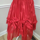 Red strapless ball gown with a cinched waist and an asymmetrical skirt; bridal gown R7297