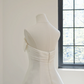 White strapless, fitted, long ball gown with a full skirt; bridal gown R8501