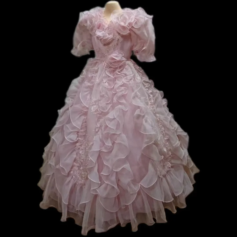 Pink vintage ball gown with a cinched waist and a voluminous puffy skirt; bridal gown R7299