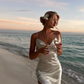 White halter-neck fitted long ball gown with slit for a sexy and elegant look R8659