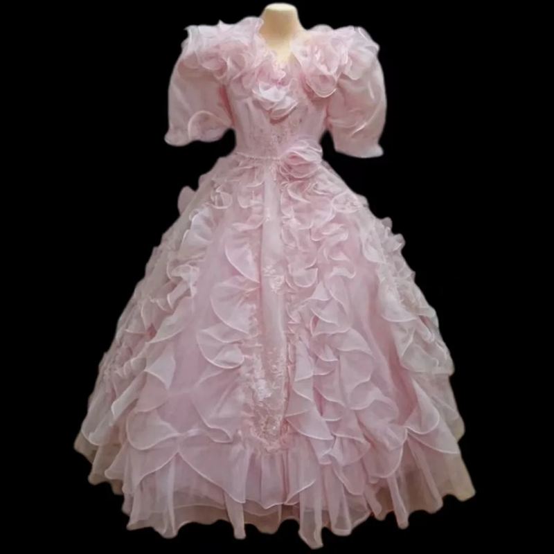 Pink vintage ball gown with a cinched waist and a voluminous puffy skirt; bridal gown R7299