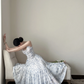 White spaghetti‑strap light blue floral print waist‑cinched slim‑fit long ball gown with a full skirt R8013