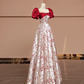 Red square neckline, fitted waist, elegant long ball gown with red floral print; bridal gown R8389