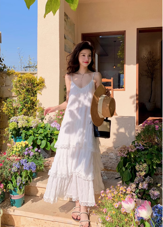 White dress seaside holiday beach dress high-end age-reducing suspender long dress R1700