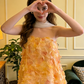 Yellow top paired with a white skirt for a ball gown R8698