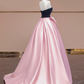 Black strapless bodice with a fitted waist and pink tulle skirt, a ball gown/bridal dress R8359
