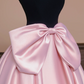 Black strapless bodice with a fitted waist and pink tulle skirt, a ball gown/bridal dress R8359