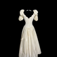 Apricot-colored, puff-sleeved, fitted, mid-length ball gown with a classic elegance R6673