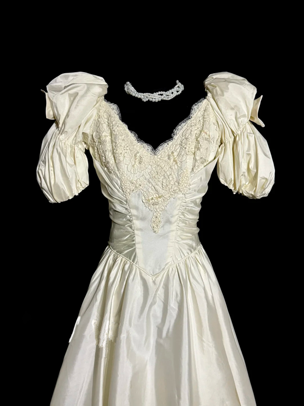 Apricot-colored, puff-sleeved, fitted, mid-length ball gown with a classic elegance R6673