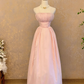 Pink strapless floor-length ball gown with a cinched waist and slim fit; bridal gown R7305