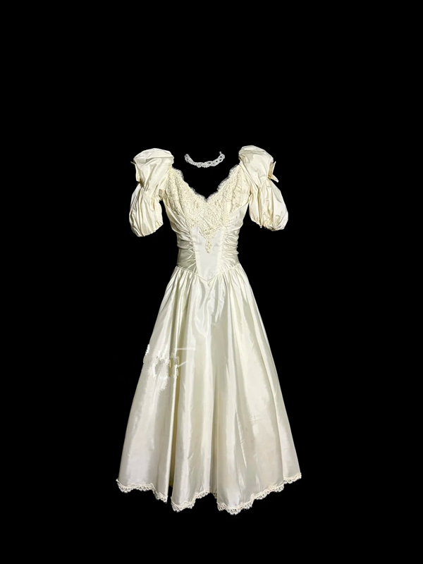 Apricot-colored, puff-sleeved, fitted, mid-length ball gown with a classic elegance R6673