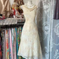 Light apricot floral sleeveless fitted waist midi ball gown R7513