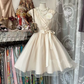 Light apricot sleeveless ball gown with a full skirt R7472
