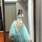 Champagne-colored strapless, fitted, long ball gown with a lake blue skirt R8853