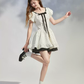 White Polka Dot Mini Dress with Black Bow and Puff Sleeves R9213