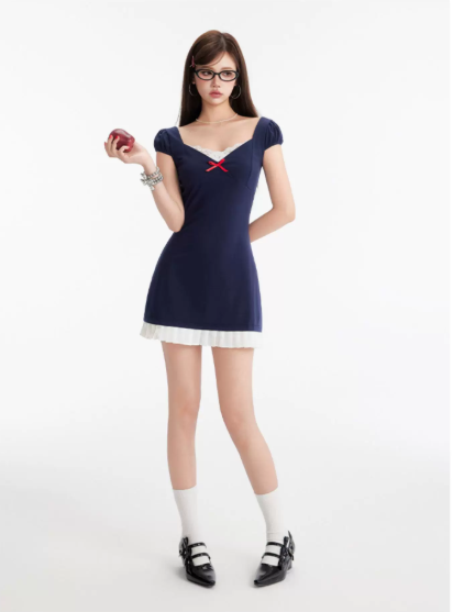 Edgy Preppy Navy Blue Mini Dress With Form-Fitting Silhouette And Red Bow Accent R9311