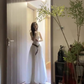 Hot girl wears white sleeveless halter dress with elegant and high-end waist A-line puffy long skirt R0418