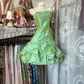Light green halter-neck, fitted waist, short ball gown with tulip-shaped embellishments R7587