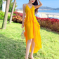 Yellow V-neck design backless dress tutu skirt irregular pleated beach suspender dress R0200