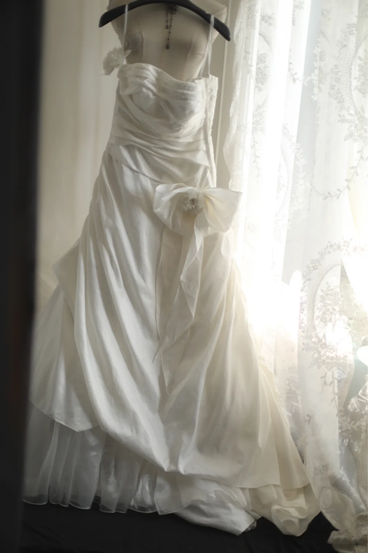 White strapless fitted satin ball gown with a full skirt and cinched waist R6796