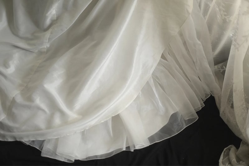 White strapless fitted satin ball gown with a full skirt and cinched waist R6796