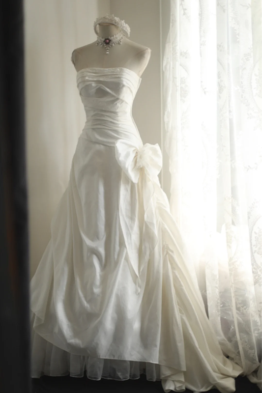 White strapless fitted satin ball gown with a full skirt and cinched waist R6796