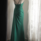 Green halter-neck fitted long ball gown with pleats R6836
