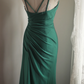 Green halter-neck fitted long ball gown with pleats R6836