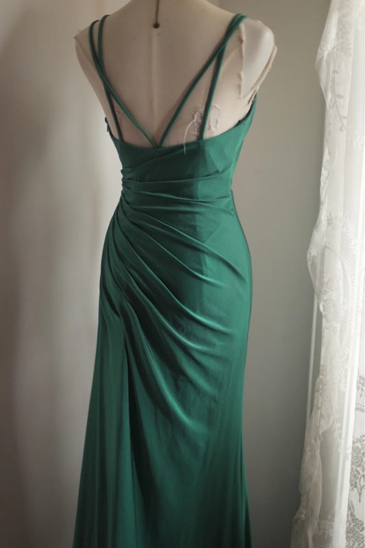Green halter-neck fitted long ball gown with pleats R6836