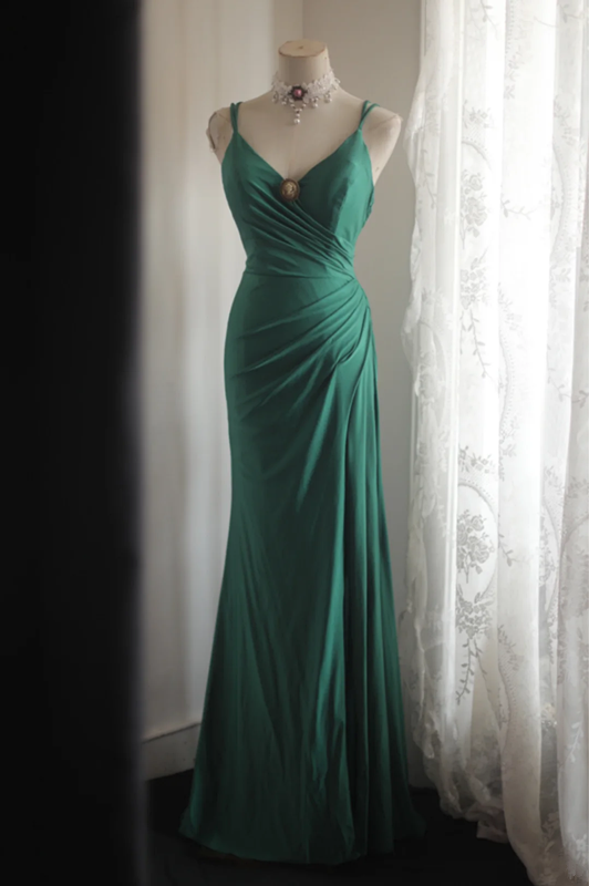 Green halter-neck fitted long ball gown with pleats R6836