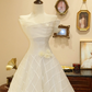 White strapless, fitted A-line long ball gown R7192