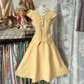 Pale yellow sleeveless fitted waist A-line short prom dress R7478