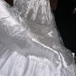 White strapless, fitted, long ball gown with pleats R7040