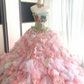 Sexy pink tulle ball gown with a fitted waist, strapless neckline, and elaborate tulle skirt R6482