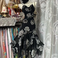 Black halter-neck rose print fitted long ball gown with an asymmetrical hem R7829