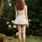 White Corset-Style Mini Dress with Lace-Up Front, Tulle Ruffle Skirt, and Thin Spaghetti Straps R9257