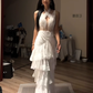White halter neck, fitted waist, and elegant tiered skirt ball gown R8077
