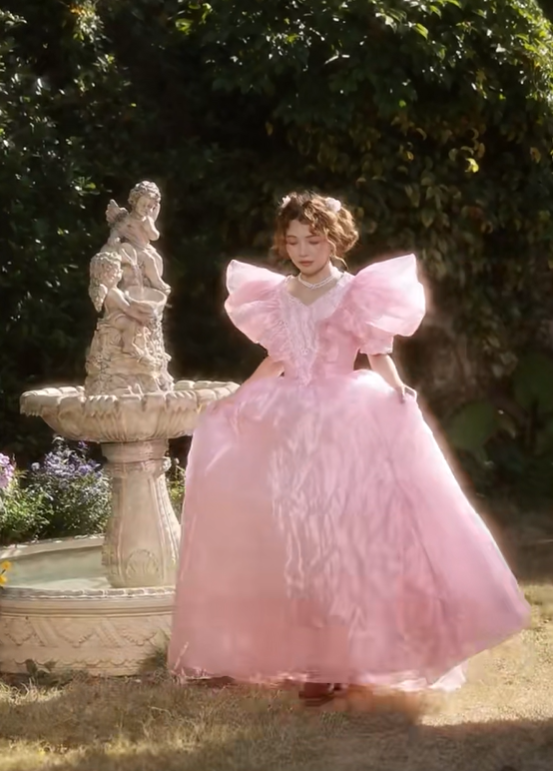 Pink floor-length ball gown with a cinched waist and slim fit, exuding elegance; bridal gown R7280