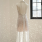 A sexy ball gown with a silver rhinestone halter neck and fitted waist, featuring a foundation and a bridal gown. R8550