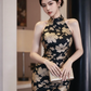 Black and gold floral print sleeveless long ball gown with a fitted waist R7527