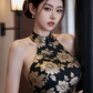 Black and gold floral print sleeveless long ball gown with a fitted waist R7527