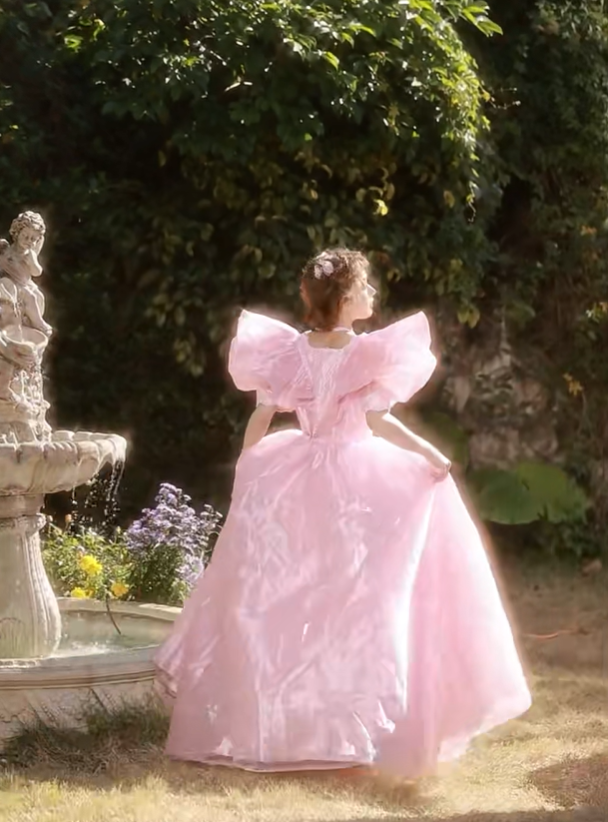 Pink floor-length ball gown with a cinched waist and slim fit, exuding elegance; bridal gown R7280