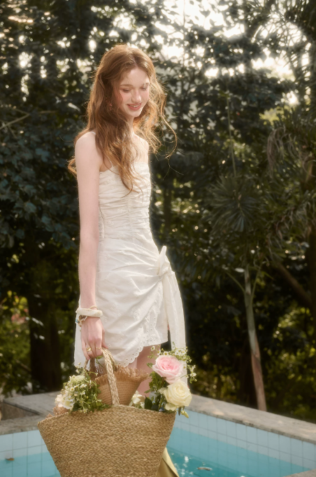 White Ruched Cami Mini Dress with Eyelet Lace Trim, Bow Tie Detail and Asymmetric Hem R9259
