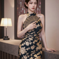 Black and gold floral print sleeveless long ball gown with a fitted waist R7527