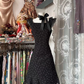 Black halter-neck polka dot A-line short ball gown with a fitted waist R7446